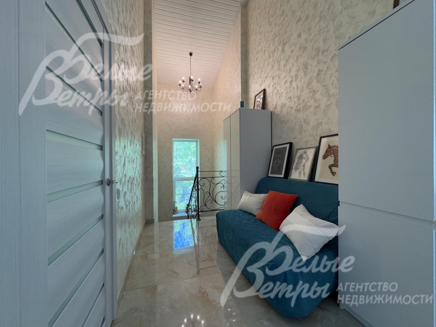 Холл на втором этаже с зоной отдыха