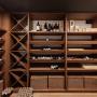 Винный погреб на 800 бутылок, мебель выполнена из ясеня.