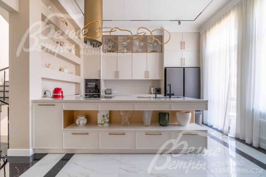 Кухня - в функциональным островом, холодильником Side by Side Liebherr, встроенной техникой Neff