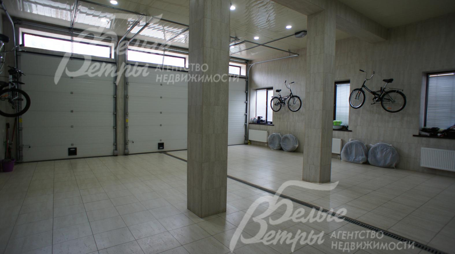 Гараж на 3 машиноместа с высокими потолками