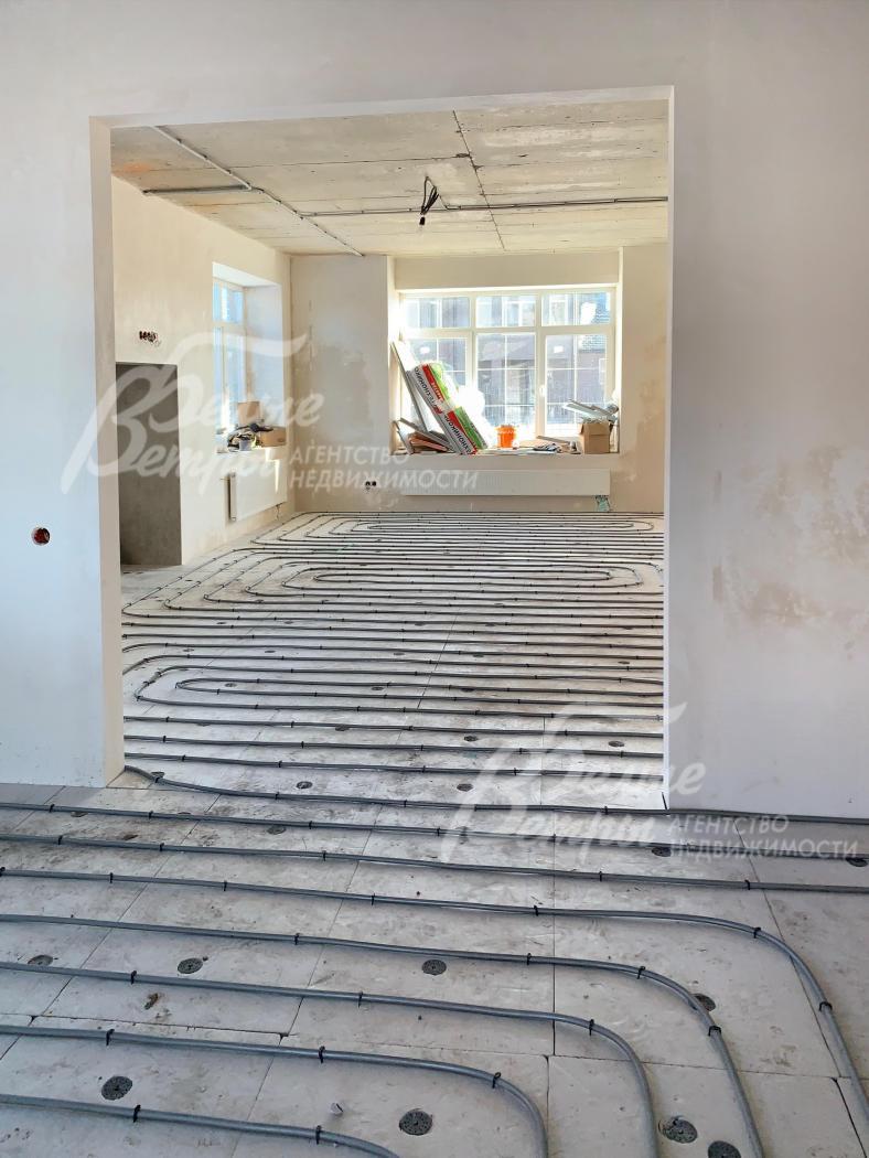 Водяной теплый пол на первом этаже